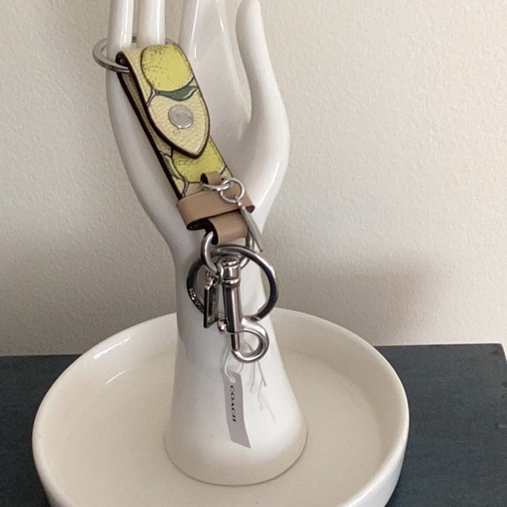 COACH Trigger Snap Bag Charm Lemon Print - Picture 3 of 6